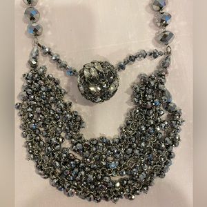 Necklace  24” 1 1/4” Smokey rhinestone ball/ cut diamond shape metal beads.